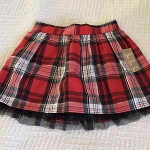 NWT. Girls size 6 short skirt with built-in shorts